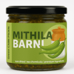 Homemade Green Chilli Pickle (Hari Mirch Ka Achar) in a Glass Jar: Spicy and tangy green chilli pickle from Mithila Barni.