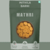 Homemade Mathri Snacks in a Stand-Up Pouch: Crispy and flaky North Indian crackers, conveniently packed by Mithila Barni.