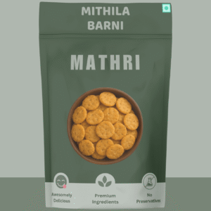 Homemade Mathri Snacks in a Stand-Up Pouch: Crispy and flaky North Indian crackers, conveniently packed by Mithila Barni.